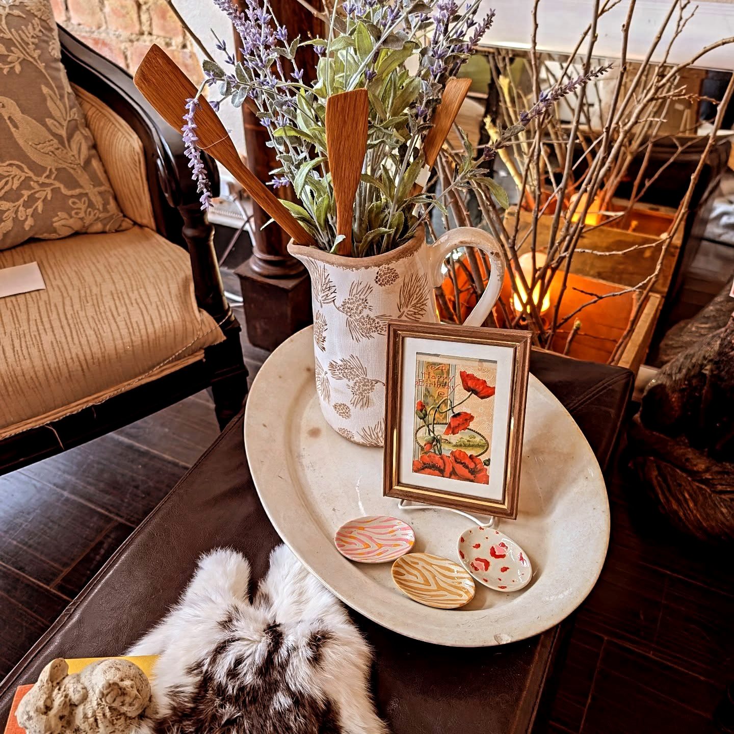 Styled vignette with florals and decor